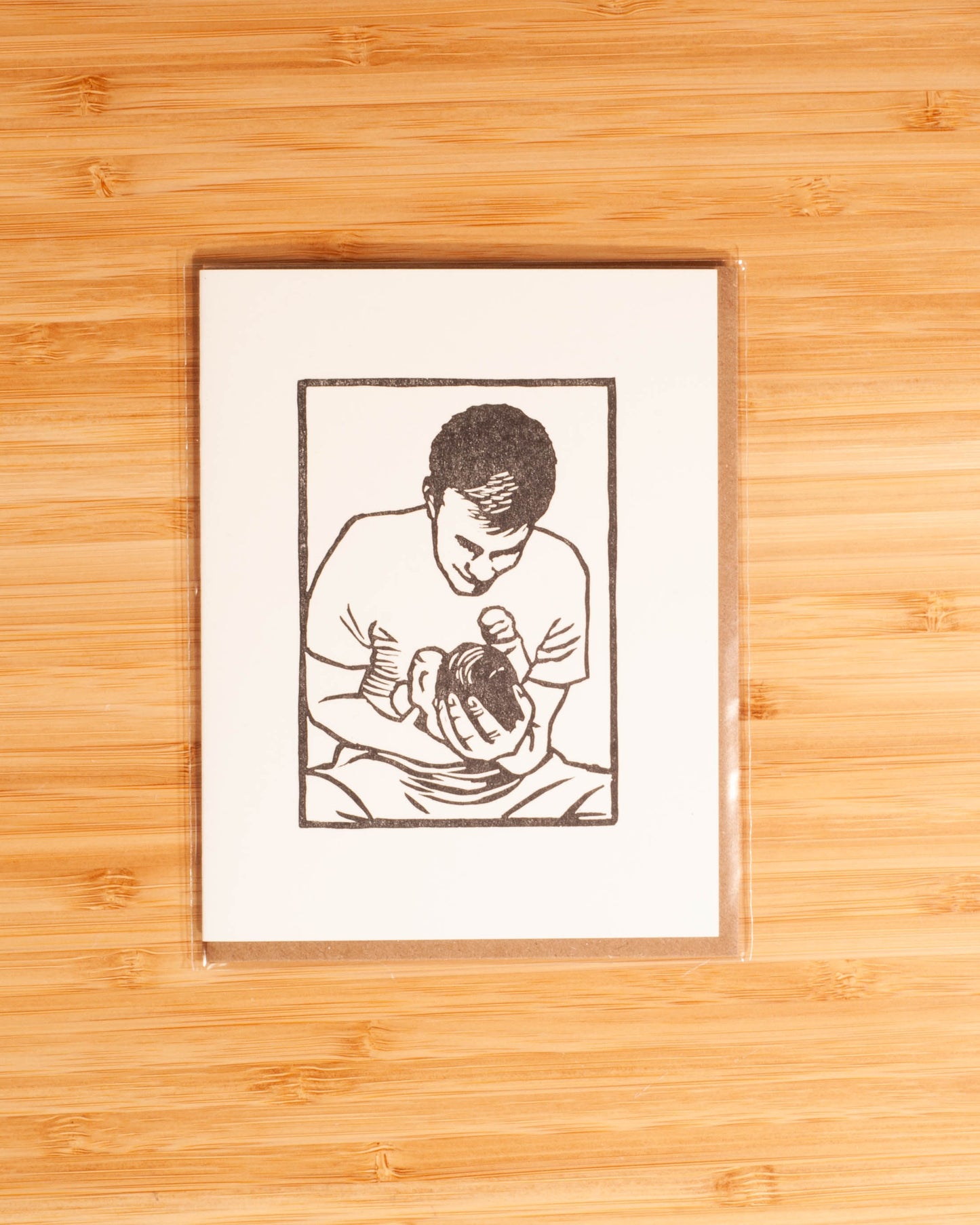 Lynn-oleum - Man/Baby Hug LETTERPRESS CARD
